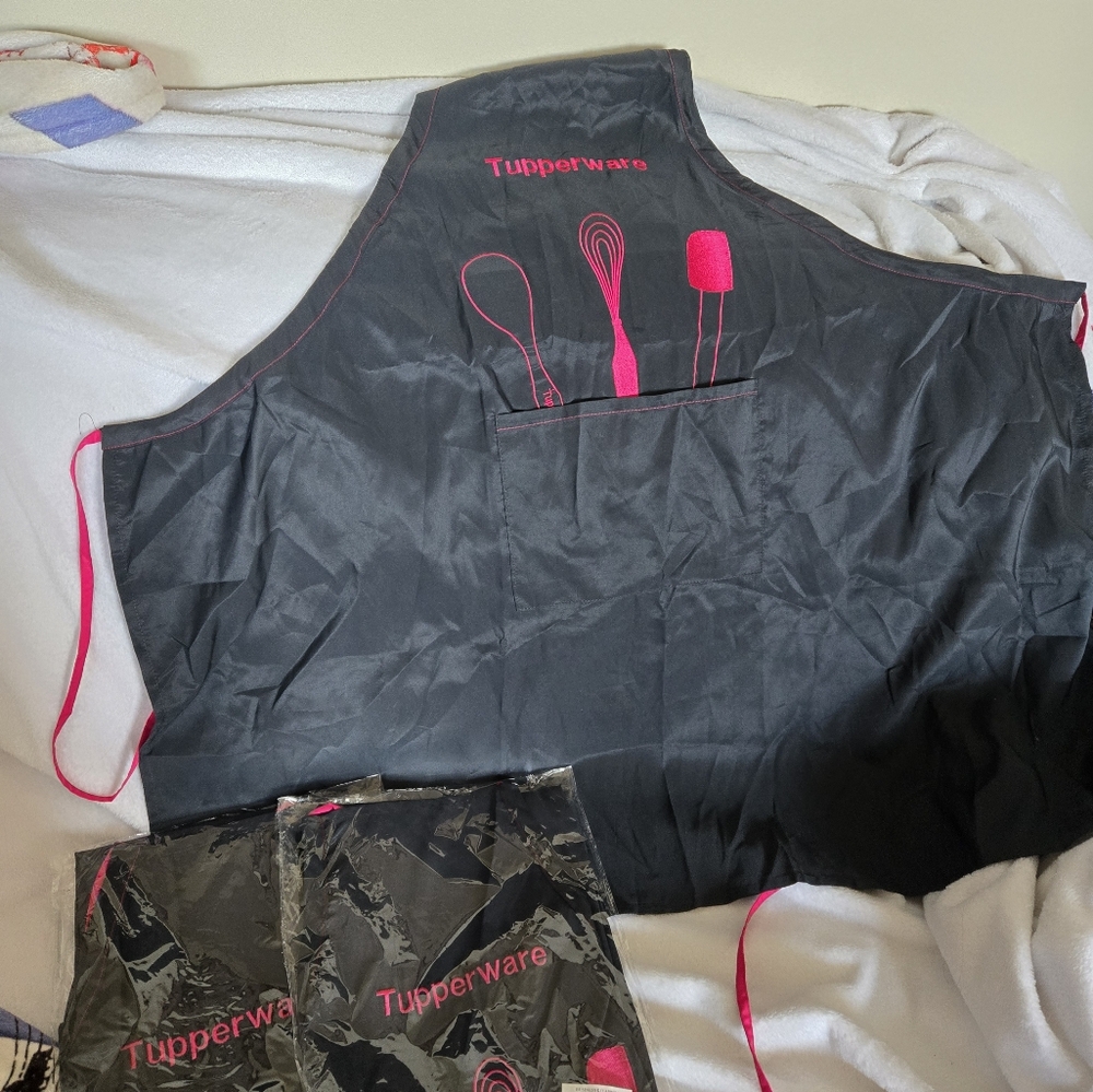 Tupperware Black Apron with Pink Utensil Design